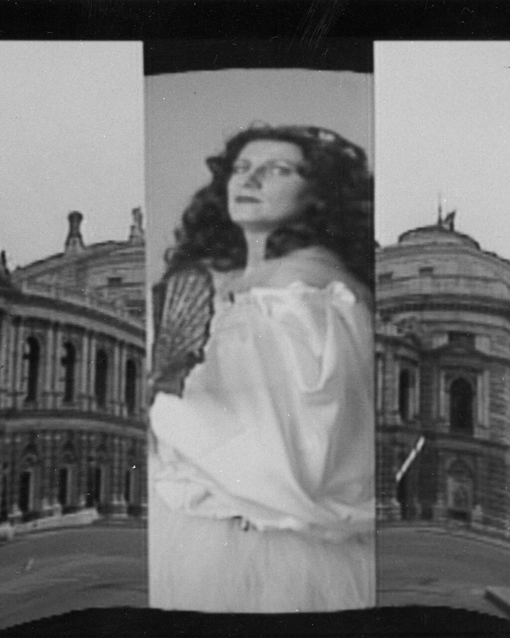 A still from "Hard Times and Culture," depicting a photo of a woman flanked by photos of a Neoclassical building.