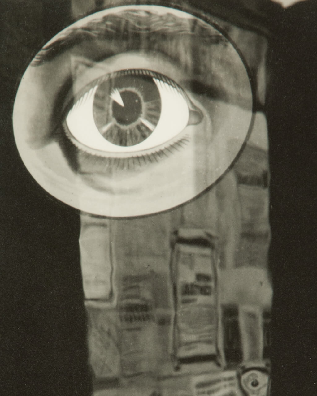 Collage of a drawing of an eye over an unclear background.