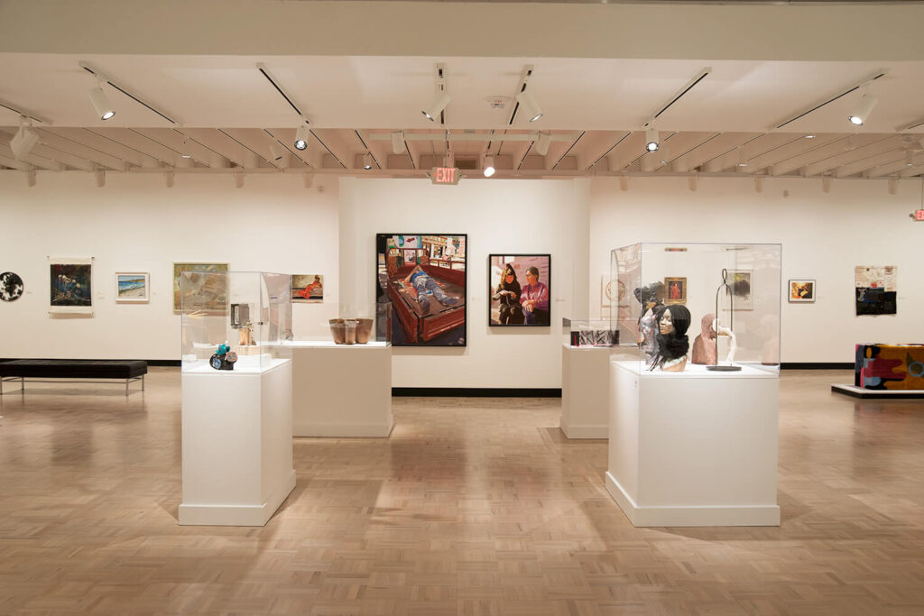 Works in cases and on the walls in the Docent Gallery for the 67th Rochester-Finger Lakes Exhibition.