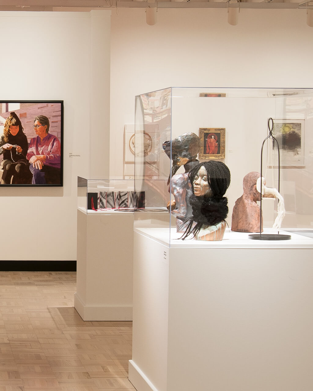 Works in cases and on the walls in the Docent Gallery for the 67th Rochester-Finger Lakes Exhibition.