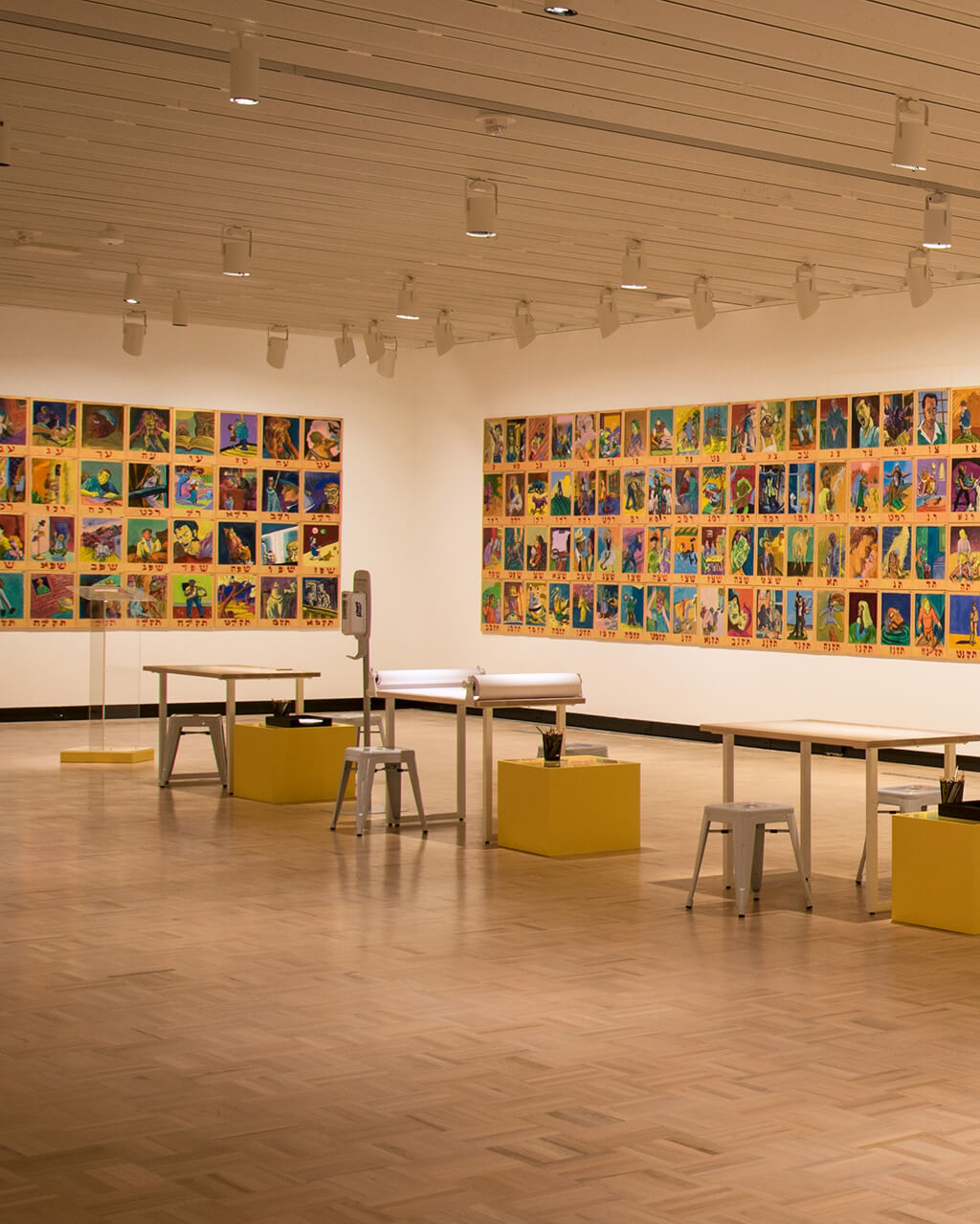 Archie Rand's "The 613" installed across multiple walls in MAG's Docent Gallery.