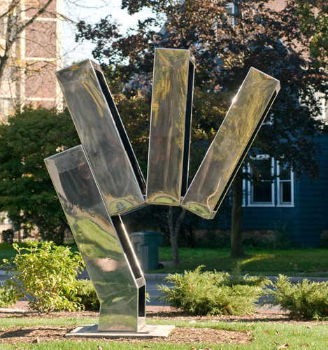 Shining steel sculpture of rectangles angled off each other