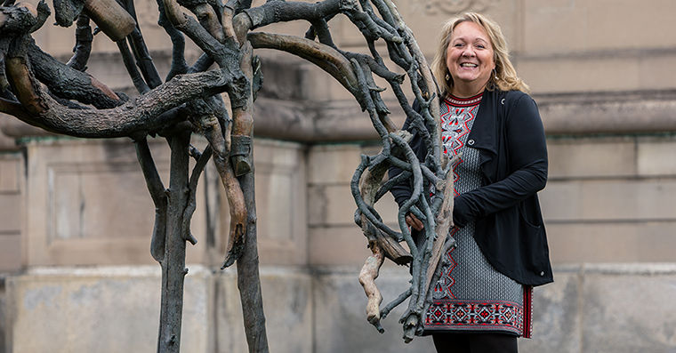 Sheri Burgstrom outside in the Sculpture Park