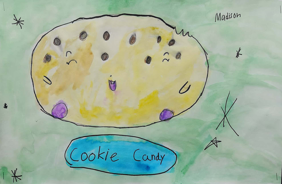 Child's drawing of a cookie with a happy smile.
