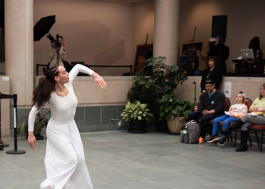 Performer dancing in the Vanden Brul Pavilion at the 2023 Black History Month Celebration Day.