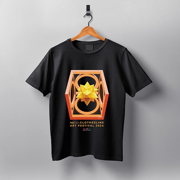 Design of a three-dimensional star within a box on a black tee-shirt.