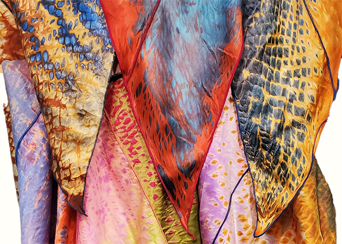 Colorfully dyed silk scarves.