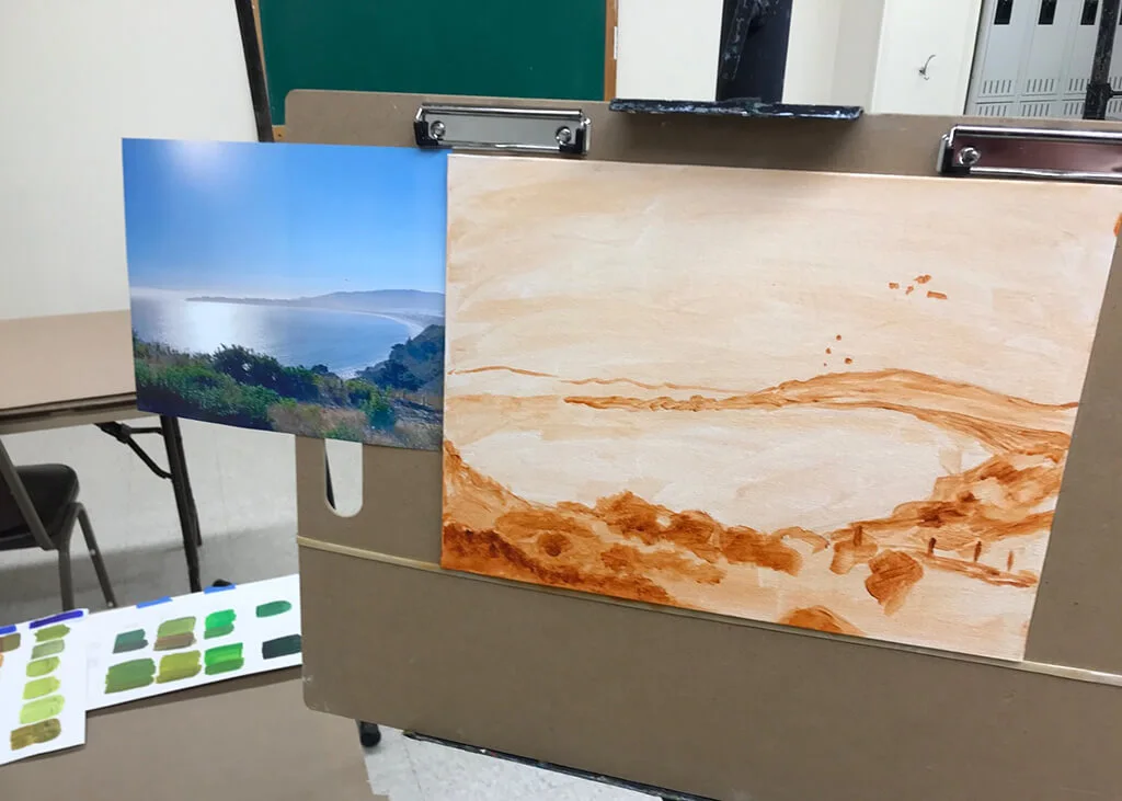 A work in progress painting based on a photograph of a landscape.