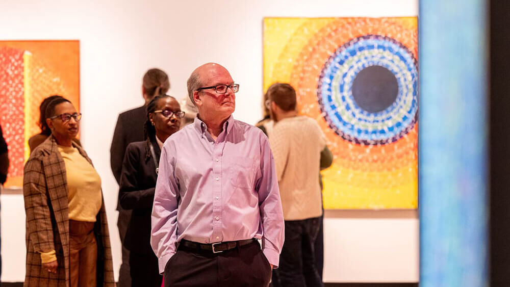 Visitors exploring the Composing Color exhibition.