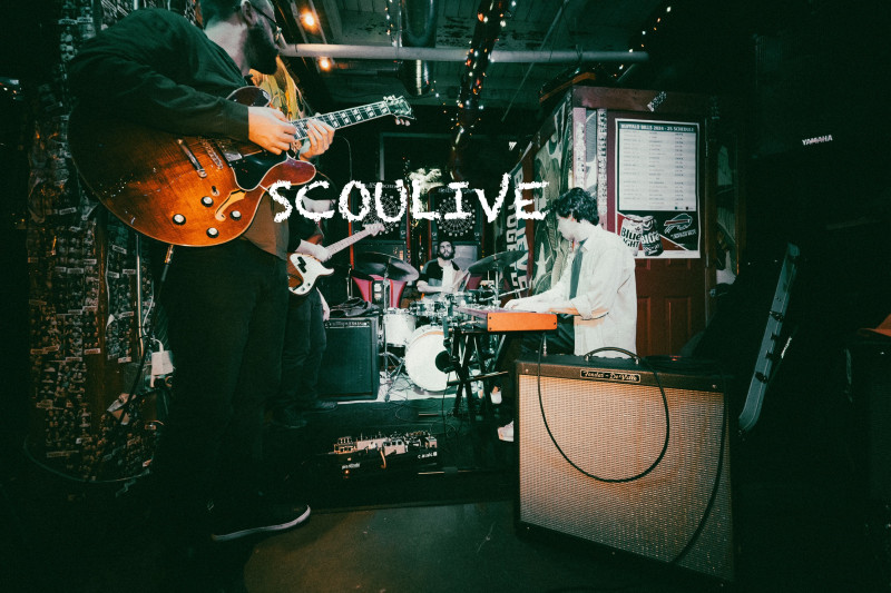 John Scofield and Soulive, with the word "Scoulive" on top.