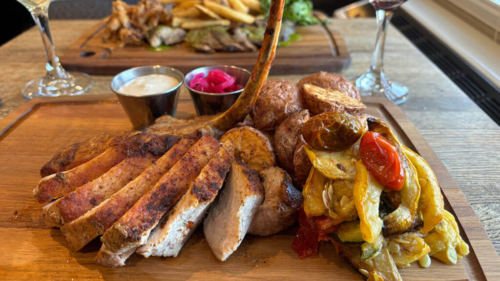 A plate of artistically-arranged pork chops.