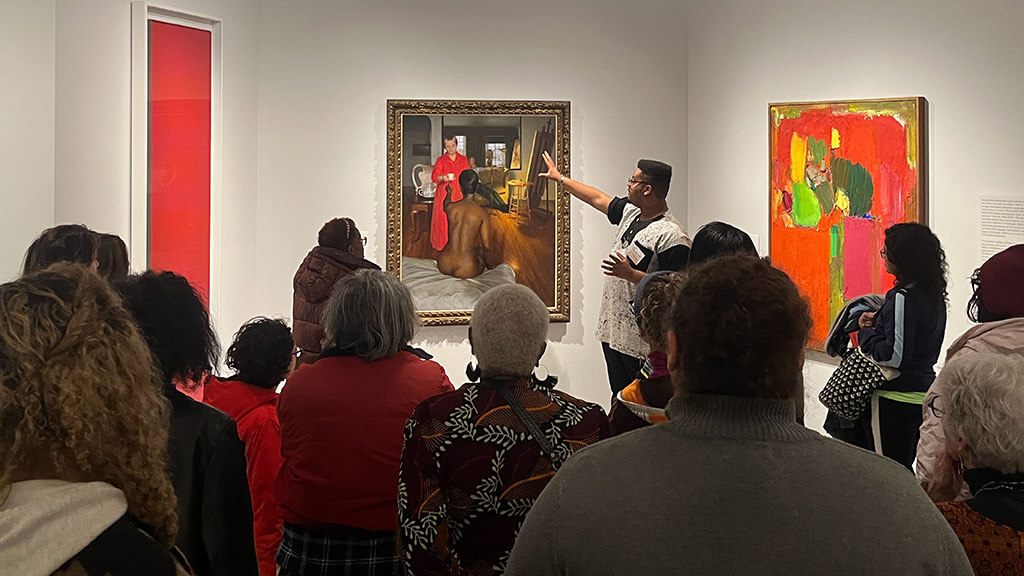 Unique Fair-Smith giving a tour in the galleries.