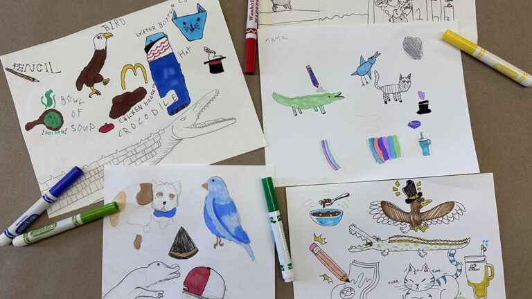 Many children's drawings of animals in pencil, pen, and markers.