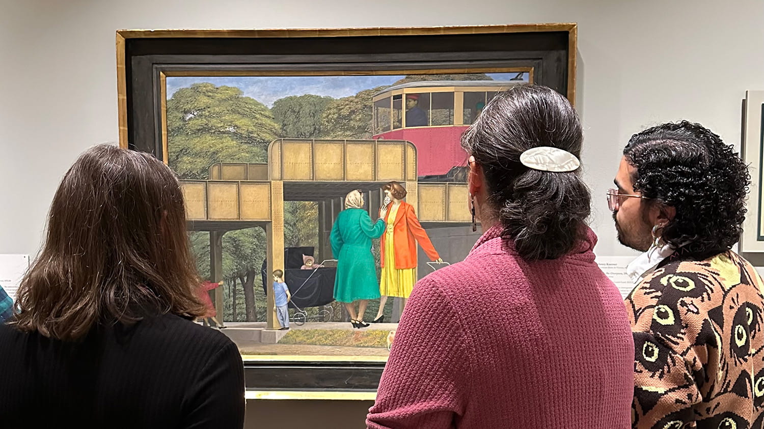 Museum patrons viewing Henry Koerner's painting "Under the Overpass."