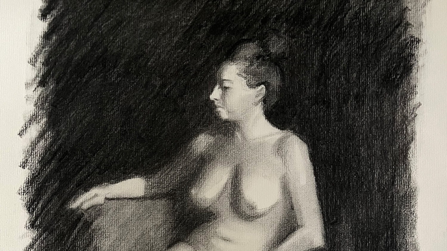 A charcoal drawing of a nude female model.