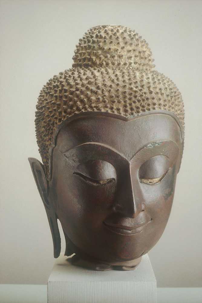 Bronze head of a Buddha.