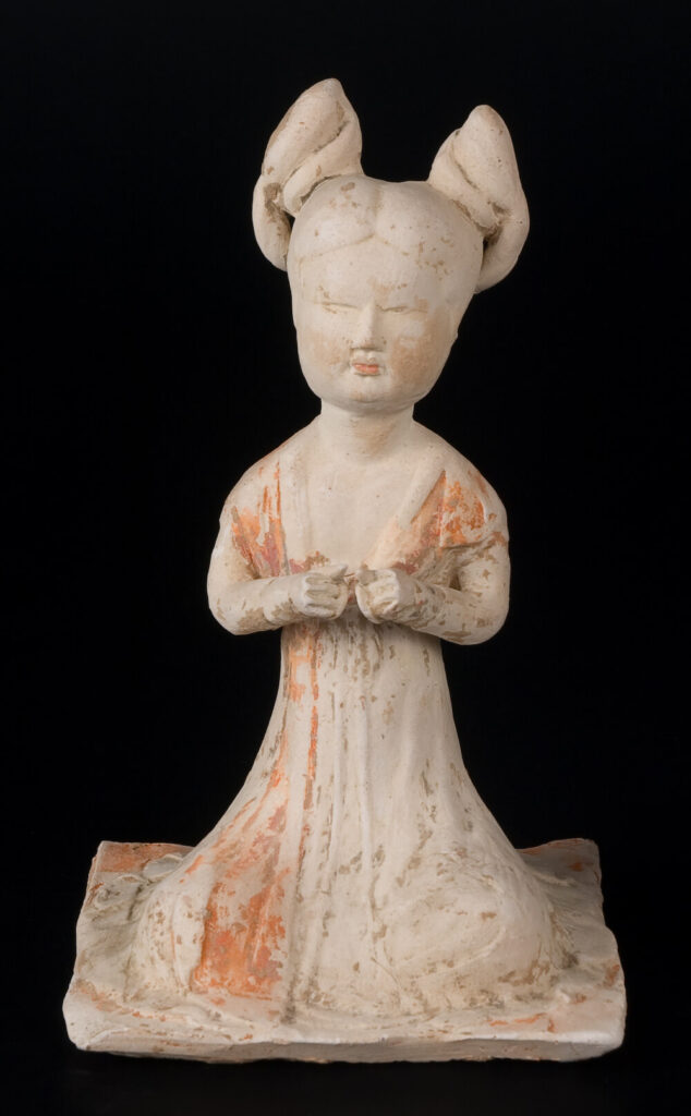 Small figurine of a kneeling female Chinese court musician.