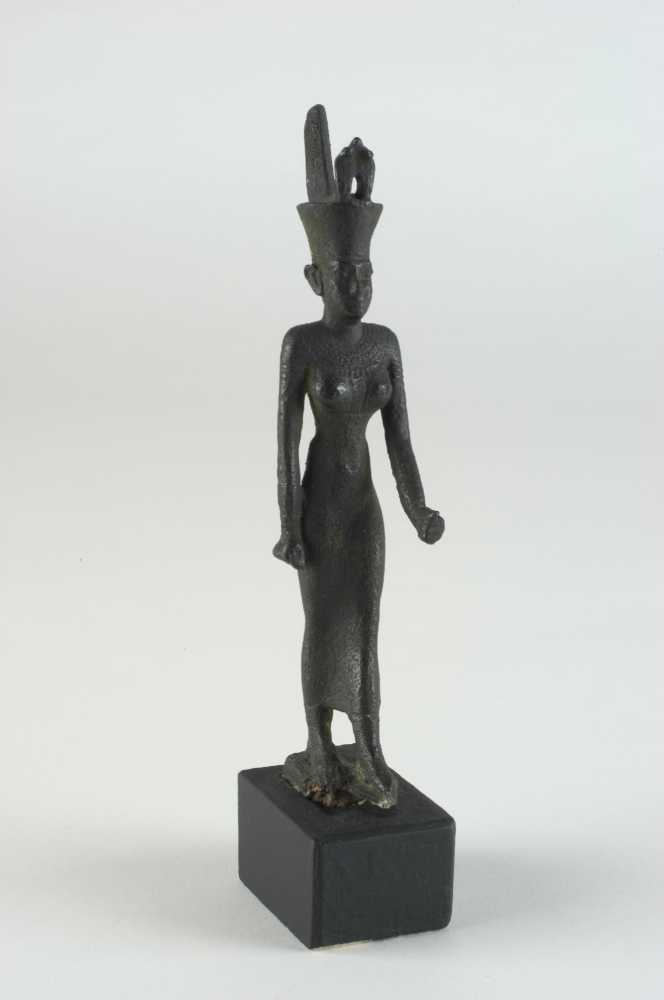 Dark bronze statue of an Egyptian goddess.