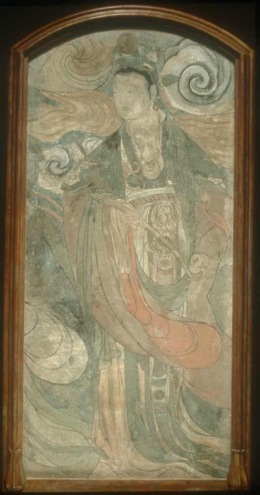 A woman in Ming Dynasty clothing holding a back-scratcher.