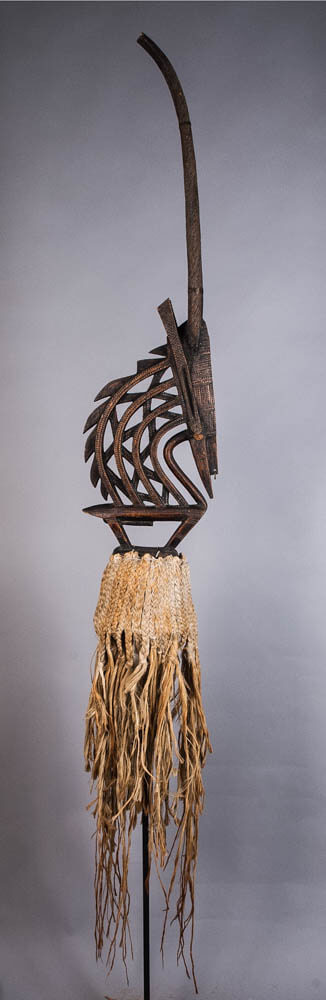 A crested mask in the shape of an antelope.