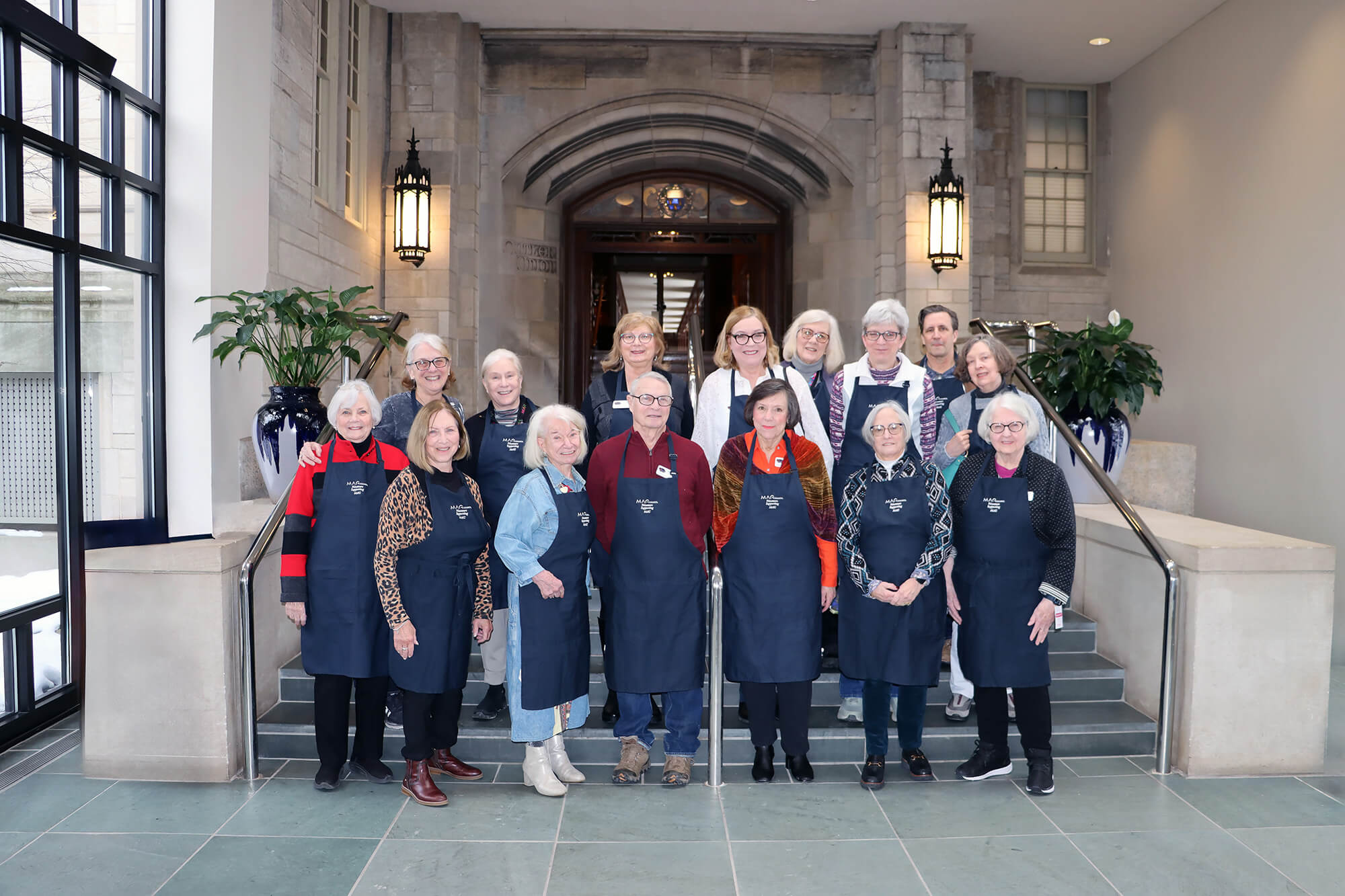 MAG Council members standing on the steps to Cutler Union.
