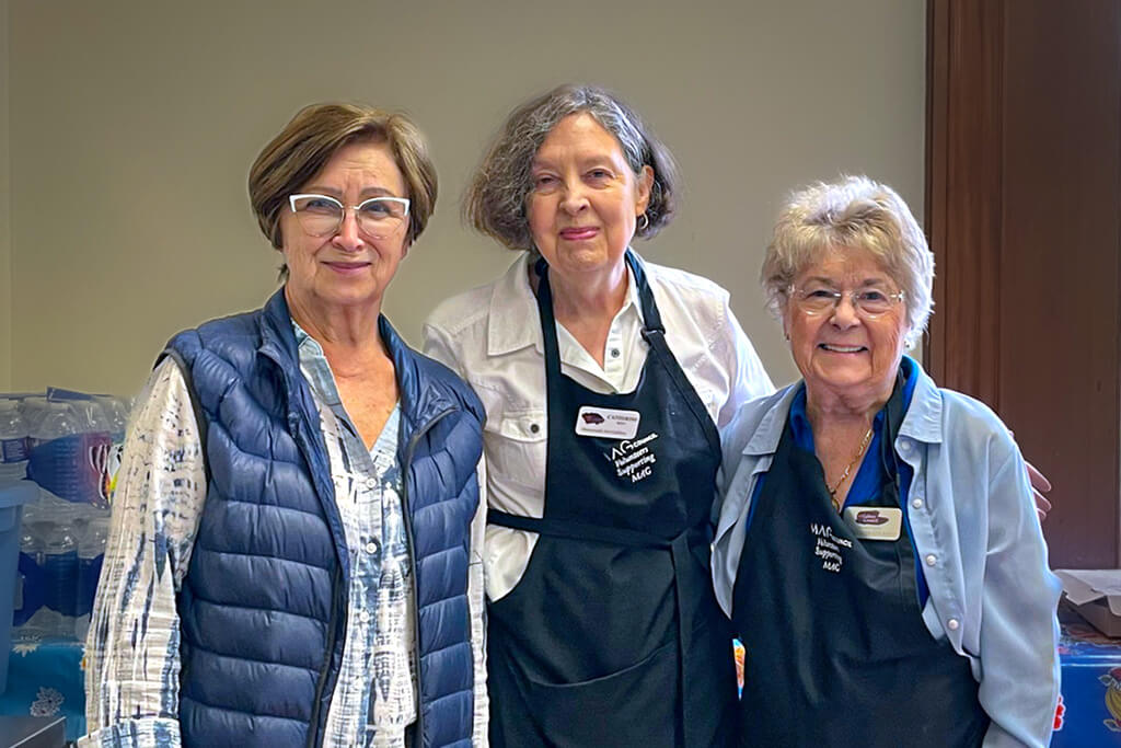 MAG Council members smiling during the 2025 Art and Treasures Sale.