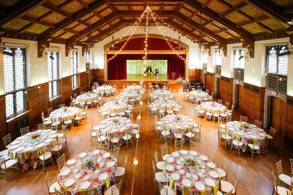 The M&T Bank Ballroom filled with finely-dressed round tables for an elegant dinner.