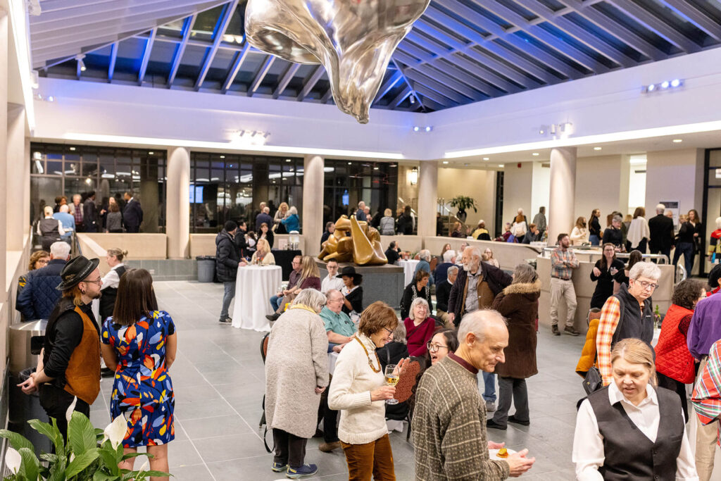 People mingling during an event in the Vanden Brul Pavilion.