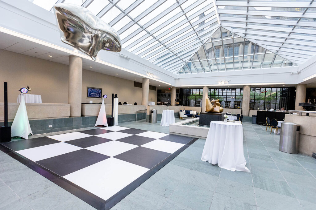 The Vanden Brul Pavilion set up with high cabs, a dance floor, seating, and a bar.