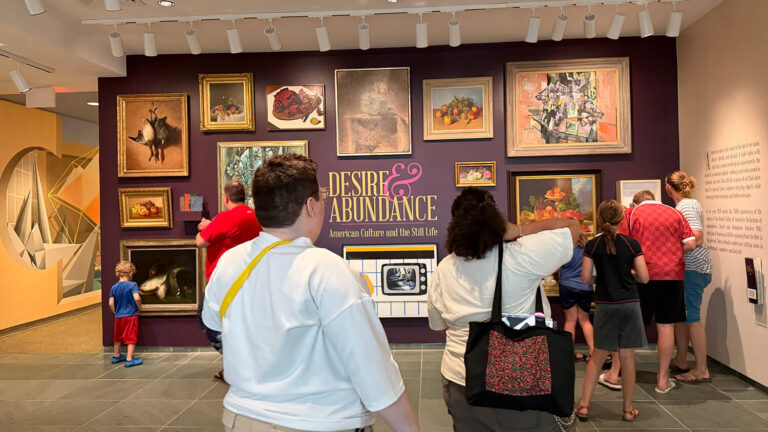 Visitors in the still life exhibition "Desire and Abundance" at MAG.