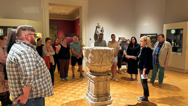 Anna Siebach-Larsen giving a tour in MAG's Medieval art gallery.